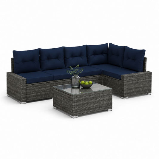 Salon de jardin d'angle 4 places gris anthracite en rotin PE avec coussins bleu marine et table basse 220 x 220 x 65 cm